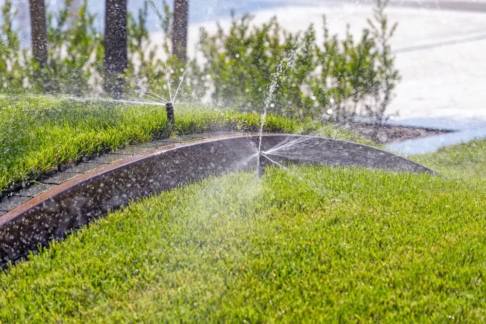 Sprinklers Watering Green Grass Mclennan County Texas