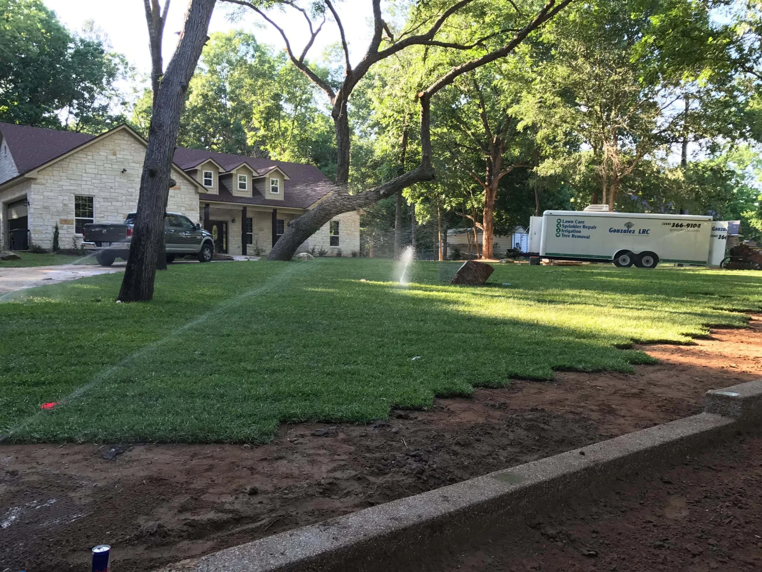 Sprinklers Watering Sodded Lawn Mclennan County Texas