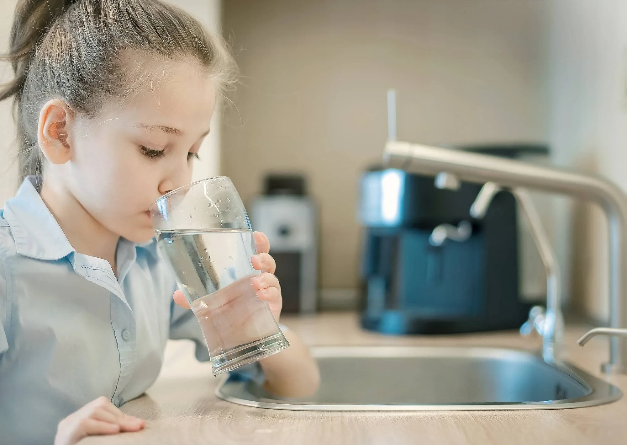 Girl Drinking Water Kitchen Mclennan County Texas